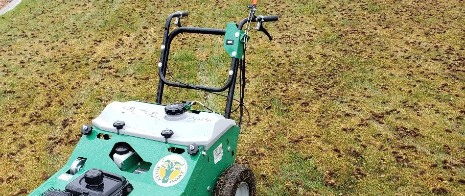 Aerated lawn in Longmont, CO, with an aerator machine.