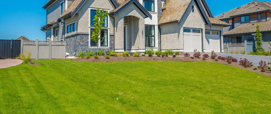 Frederick, CO home with a running irrigation system.