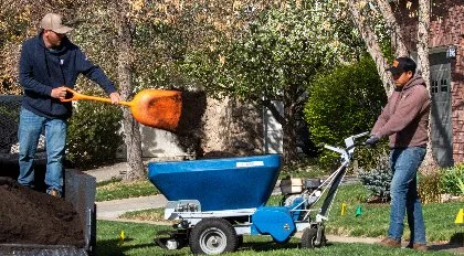 Total Turf Lawn Care employees working.